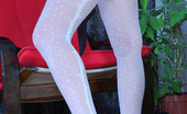 ePantyhose Land 560590 Ophelia Busty Long-Haired Blonde Showing Off Her Dotted Black And White Pantyhose ePantyhose Land
