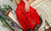 ePantyhose Land 560629 Nell Seductive Babe Posing By The Mirror In A Red Nighty And Black Fashion Hose ePantyhose Land
