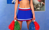 ePantyhose Land 560805 Sibylla Sporty Cheerleader In Flesh-Colored Pantyhose Pulling Up Her Flying Skirt ePantyhose Land
