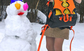 ePantyhose Land 560833 Katrine Stunning Chick In Flesh-Colored Pantyhose Making Snowman In Winter Forest ePantyhose Land
