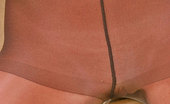 ePantyhose Land 561178 Dominica Pantyhosed Redhead Cutie With Well-Shaped Body Undressing In Seducing Way ePantyhose Land
