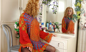 ePantyhose Land 561415 Florence Curly Chick Enjoying Reflection Of Her Sexy Pantyhosed Legs In The Mirror ePantyhose Land
