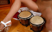 ePantyhose Land 561585 Lilia Tempting Babe Eagerly Plays The Drum Wearing Just Her Soft Silky Pantyhose ePantyhose Land
