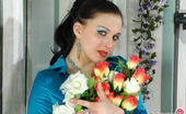 ePantyhose Land 561907 Laura Raunchy Brunette In Smooth Pantyhose Smelling Fragrant Aroma Of Her Flowers ePantyhose Land
