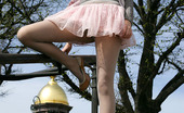 ePantyhose Land 562224 Essie Bold Girl Posing Outdoors In Flying Skirt And No Panties Under Matte Tights ePantyhose Land
