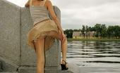 ePantyhose Land 562243 Leila Bold Babe In Shiny Tights Spreading Legs Flashing Her Panties At The Quay ePantyhose Land
