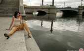 ePantyhose Land 562243 Leila Bold Babe In Shiny Tights Spreading Legs Flashing Her Panties At The Quay ePantyhose Land
