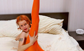 ePantyhose Land 562406 Milared Flexi Gal In Orange Pantyhose Revealing Her Wild Imagination In Nylon Games ePantyhose Land
