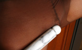 ePantyhose Land 562723 Hellena Fiery Babe Hikes Up Her Skirt Flashing Yummy Buns In Brown Control Top Hose ePantyhose Land
