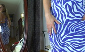 ePantyhose Land 562998 Dinah Tempting Chick Putting On Smooth Grey Hose And Trying On Different Dresses ePantyhose Land
