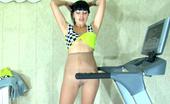 ePantyhose Land 563051 Muriel Brunette Strips Her Sporty Outfit Exercising On A Treadmill Just In Tights ePantyhose Land
