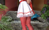 ePantyhose Land 563104 Hazel Shy Gal Trades Her Sheer Hose For Bright Red Ones To Go With A Maid Uniform ePantyhose Land

