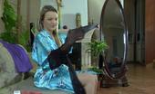 ePantyhose Land 563114 Connie Dressed Up Beauty Admires Her Look In The Mirror While Putting On Her Hose ePantyhose Land
