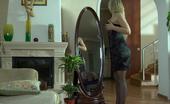 ePantyhose Land 563114 Connie Dressed Up Beauty Admires Her Look In The Mirror While Putting On Her Hose ePantyhose Land
