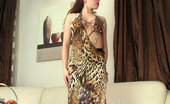 ePantyhose Land 563201 Theodora Well-Stacked Hottie Chooses A Pair Of Tights To Wear With Her Leopard Dress ePantyhose Land
