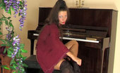 ePantyhose Land 563248 Tina Flirty Pianist Changes Into Pink Patterned Tights To Play With Her Dildo ePantyhose Land
