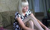 ePantyhose Land Mirabel Hot Platinum Blonde Admires The Look Of Funky Fashion Hose On Her Long Legs ePantyhose Land

