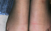 Nylon Feet Line 563400 Anna Luscious Gal Sliding Her Hand Under Pantyhose Waistband To Spread Her Pussy Nylon Feet Line
