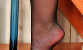 Nylon Feet Line 563693 Elvira Frisky Chick Can Hold Whatever She Can Find Just Using Her Pantyhosed Feet Nylon Feet Line
