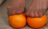Nylon Feet Line 563990 Lilu Fiery Gal Takes Off Her Red Pumps And Rubs An Orange With Her Nyloned Feet Nylon Feet Line

