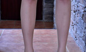 Nylon Feet Line 564069 Jean Upskirt Teaser Showing Off Her Feet In Nude Pantyhose And Coral Spike Heels Nylon Feet Line
