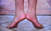 Nylon Feet Line 564069 Jean Upskirt Teaser Showing Off Her Feet In Nude Pantyhose And Coral Spike Heels Nylon Feet Line
