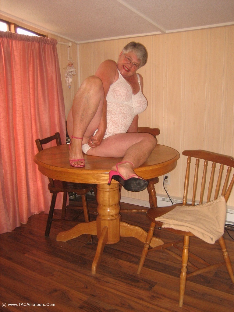 TAC Amateurs Dining Room Table Girdlegoddess On The Dining Room Table, In Her Pink Dress, Slip And All In One Body Shaper
